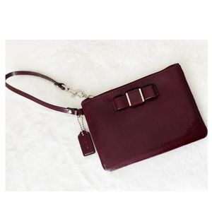 MAKE OFFERS Burgundy Coach Wristlet